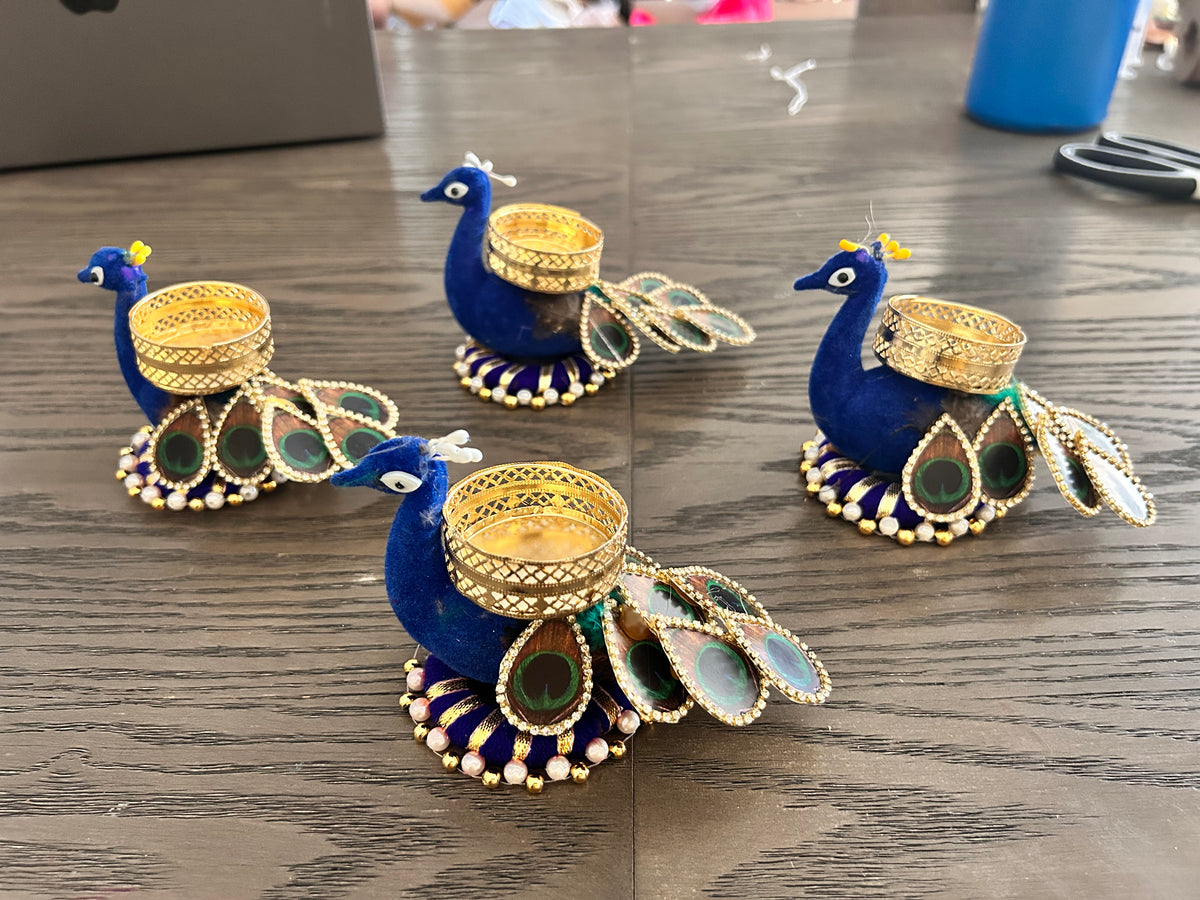Velvet Peacock Tealight Holder with Feather Tail