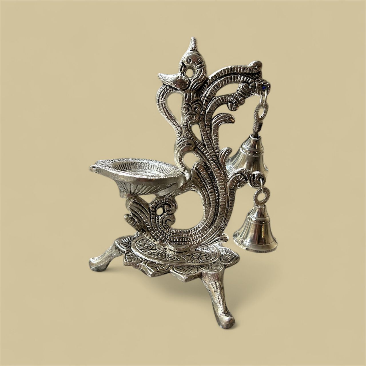 Silver Peacock Diya – A Radiant Symbol of Divine Elegance