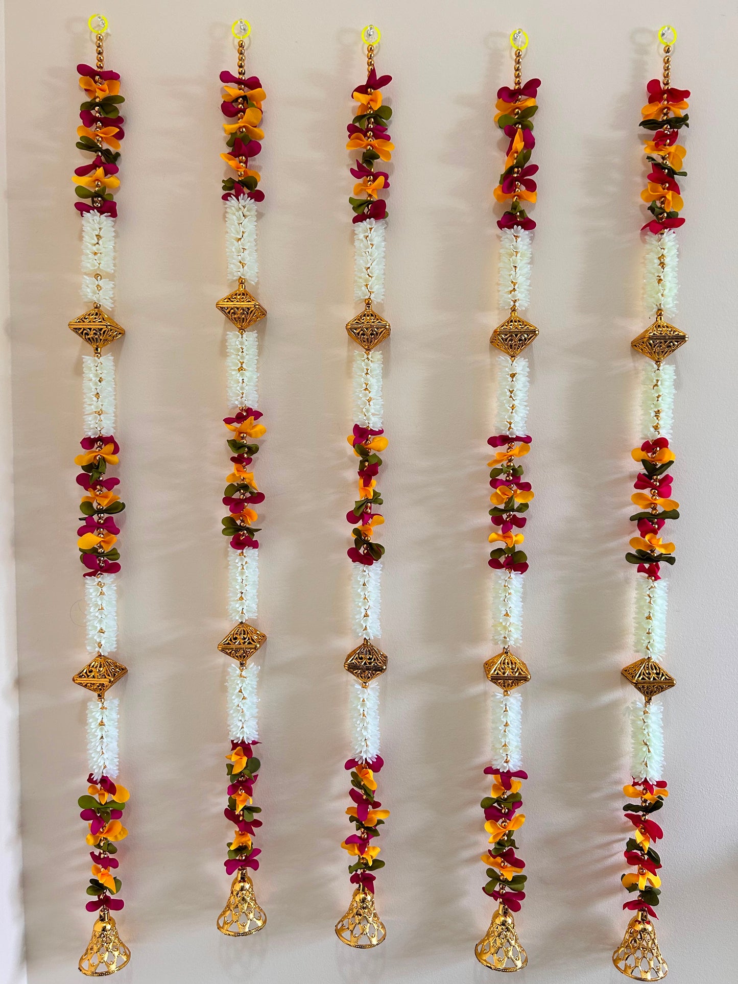 Multicolour Floral Garland with Golden Filigree Diamonds &amp; Bell