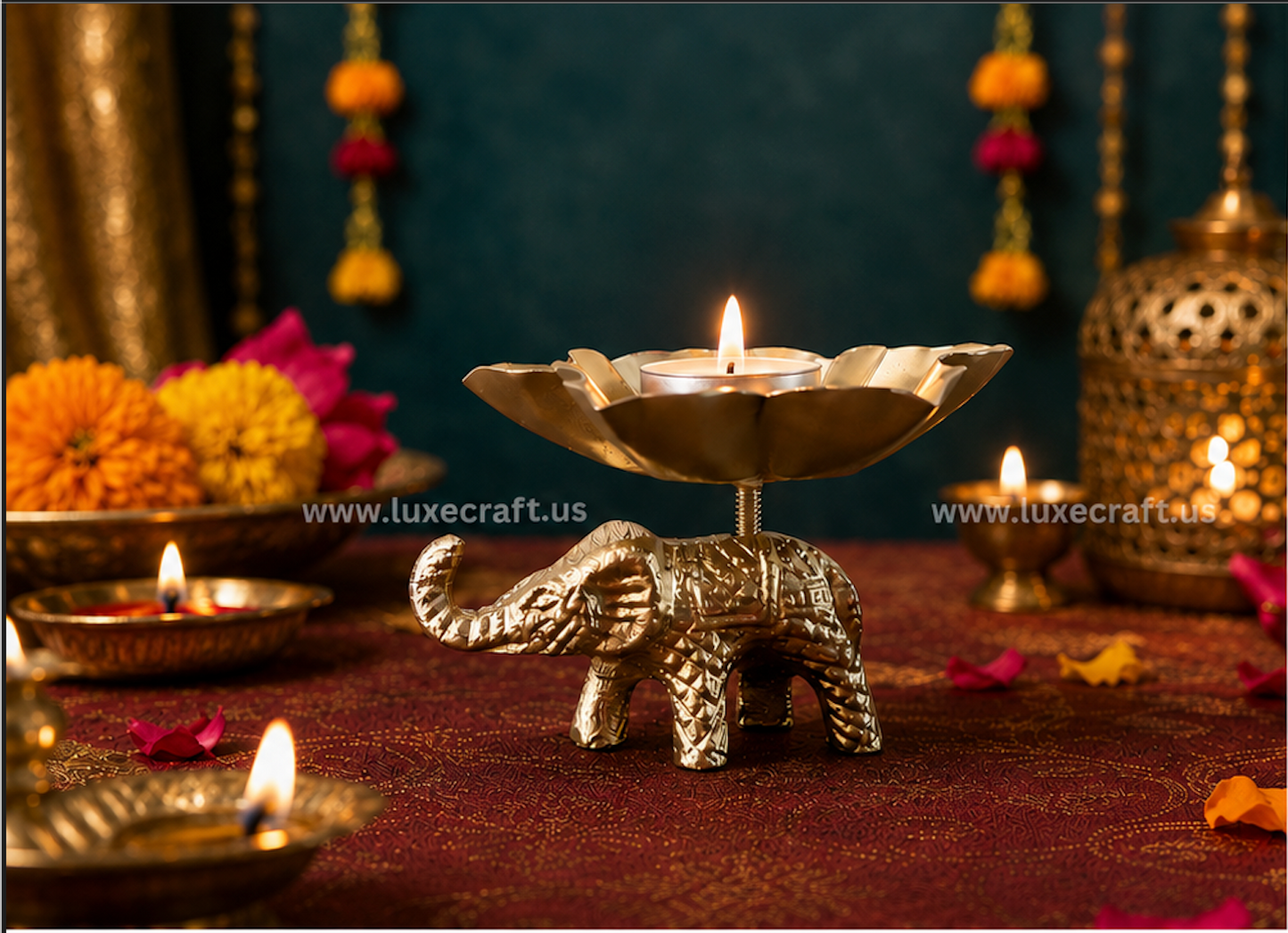 Brass Elephant Lotus Tea-Light Holder - hero shot with lit candle